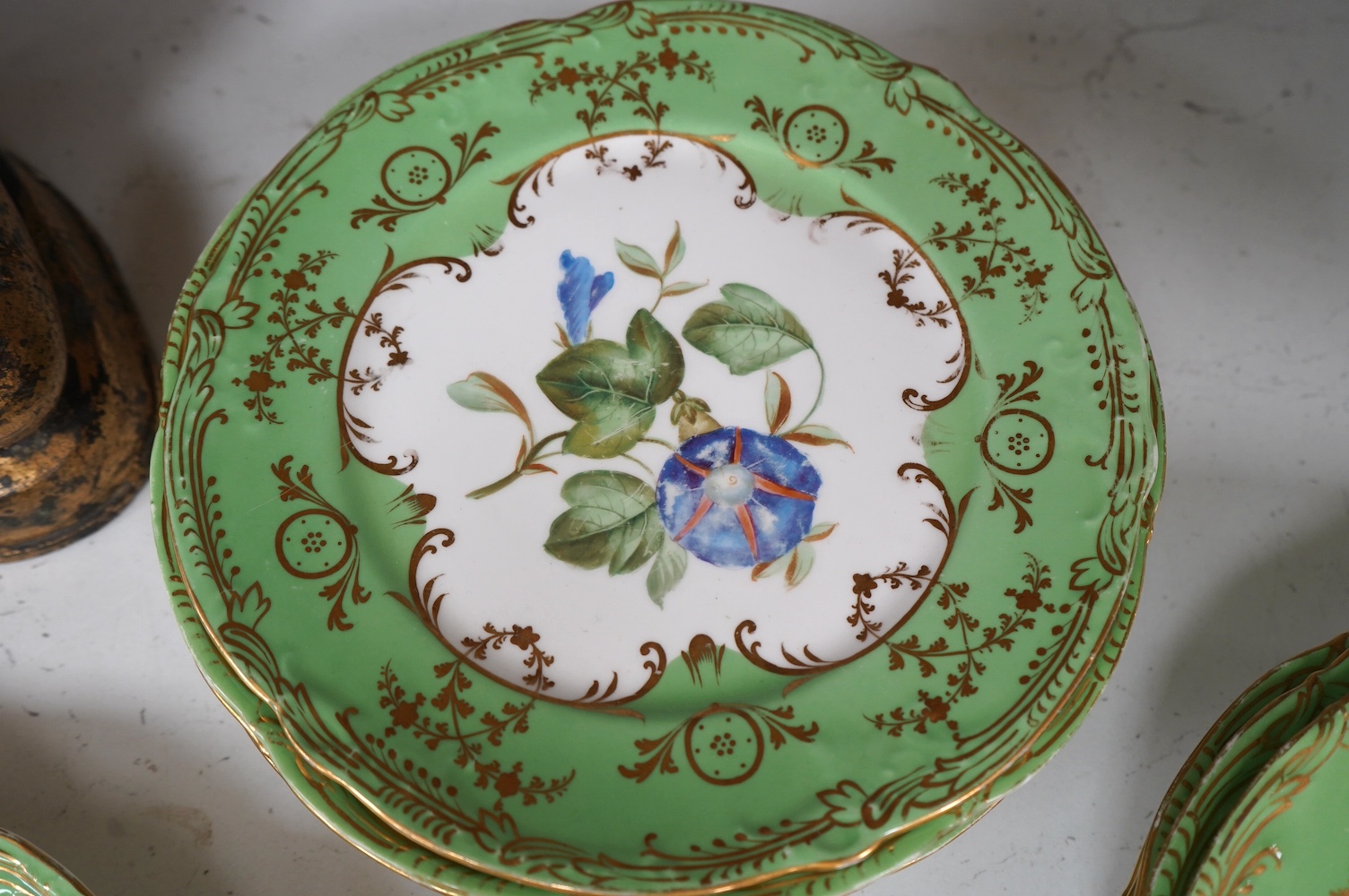 A mid 19th century English porcelain part dessert service hand painted with flowers, largest 30cm wide. Condition - mostly good